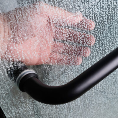 hard water stains on a glass shoer door